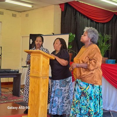 Simon's Branch team distributes coats and gifts.